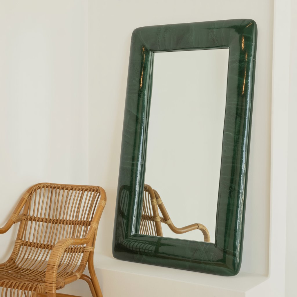 DAGGKAPRIFOL dark green mirror leaning against wall with rattan chair
